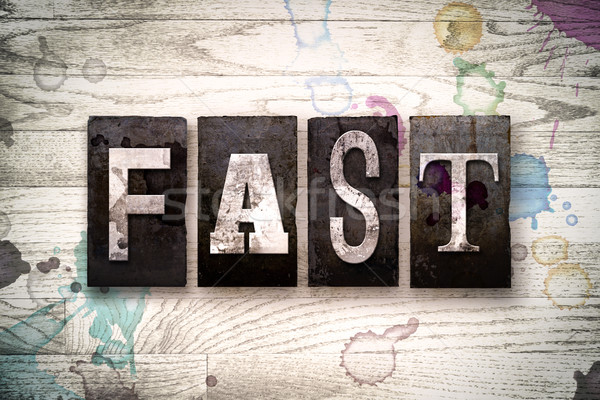 Fast Concept Metal Letterpress Type Stock photo © enterlinedesign