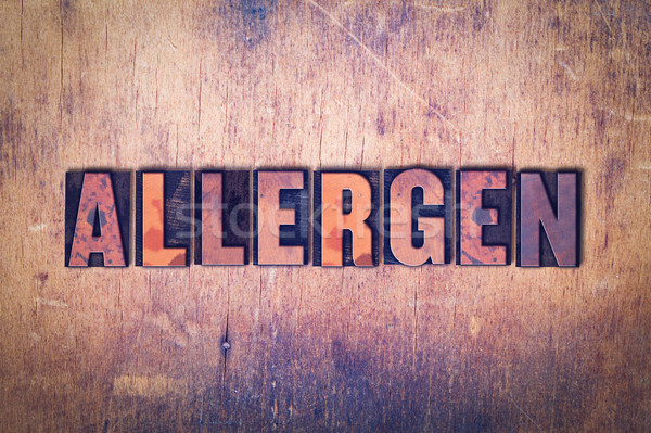 Allergen Theme Letterpress Word on Wood Background Stock photo © enterlinedesign