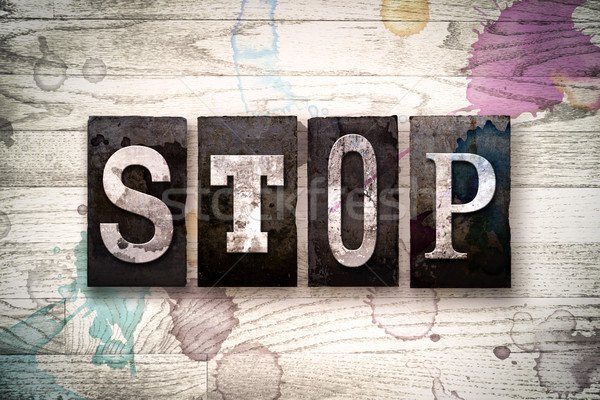 Stop Concept Metal Letterpress Type Stock photo © enterlinedesign