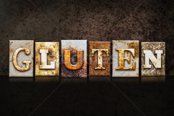Gluten Letterpress Concept on Dark Background Stock photo © enterlinedesign