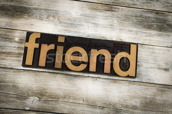 Friend Letterpress Word on Wooden Background Stock photo © enterlinedesign