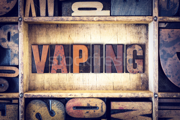 Vaping Concept Letterpress Type Stock photo © enterlinedesign