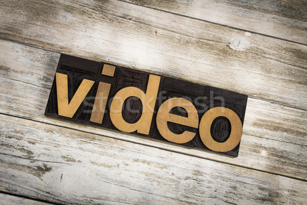 Video Letterpress Word on Wooden Background Stock photo © enterlinedesign