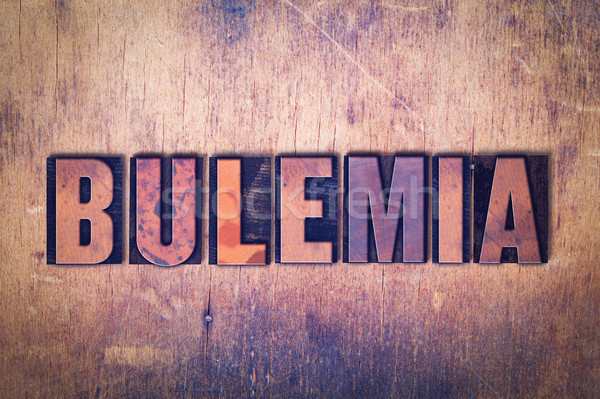 Bulemia Theme Letterpress Word on Wood Background Stock photo © enterlinedesign