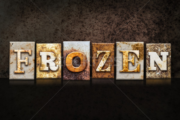 Frozen Letterpress Concept on Dark Background Stock photo © enterlinedesign