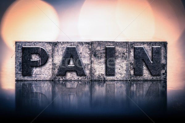 Pain Concept Vintage Letterpress Type Stock photo © enterlinedesign