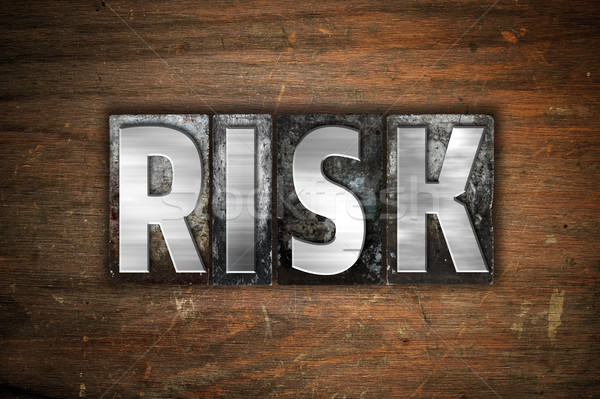 Risk Concept Metal Letterpress Type Stock photo © enterlinedesign