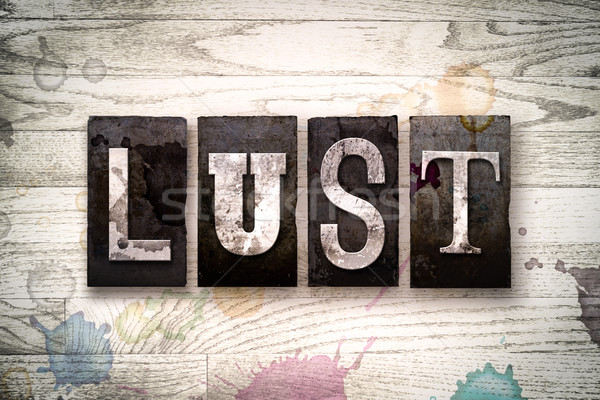 Lust Concept Metal Letterpress Type Stock photo © enterlinedesign