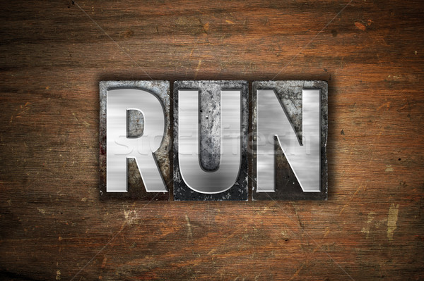 Stock photo: Run Concept Metal Letterpress Type