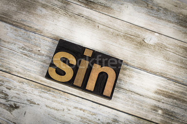 Peccato parola legno scritto tipo Foto d'archivio © enterlinedesign