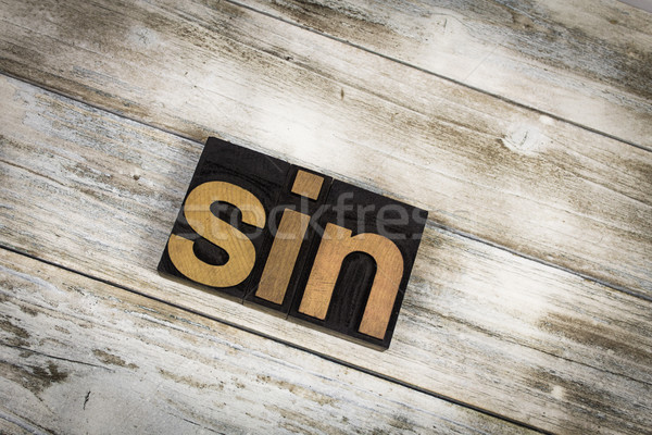 Stock photo: Sin Letterpress Word on Wooden Background