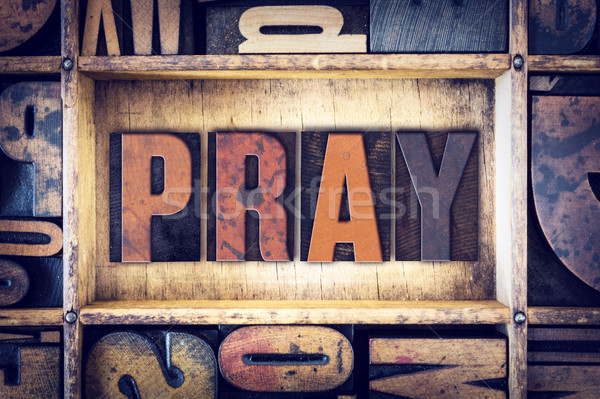 Pray Concept Letterpress Type Stock photo © enterlinedesign