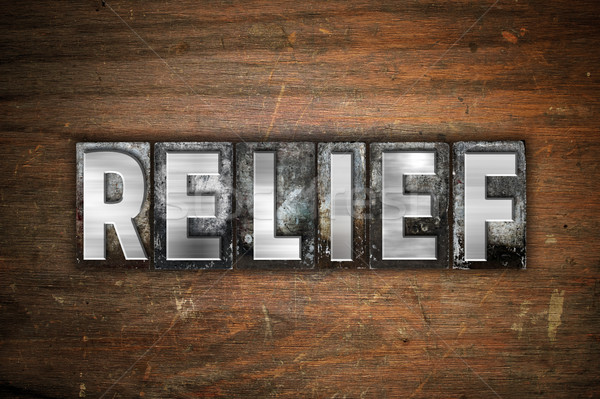 Relief Concept Metal Letterpress Type Stock photo © enterlinedesign