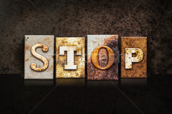 Stop Letterpress Concept on Dark Background Stock photo © enterlinedesign