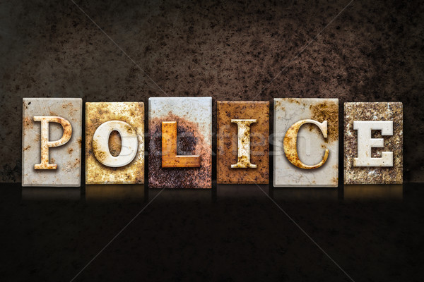 Police Letterpress Concept on Dark Background Stock photo © enterlinedesign