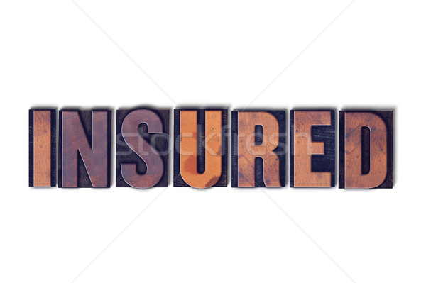 Insured Concept Isolated Letterpress Word Stock photo © enterlinedesign