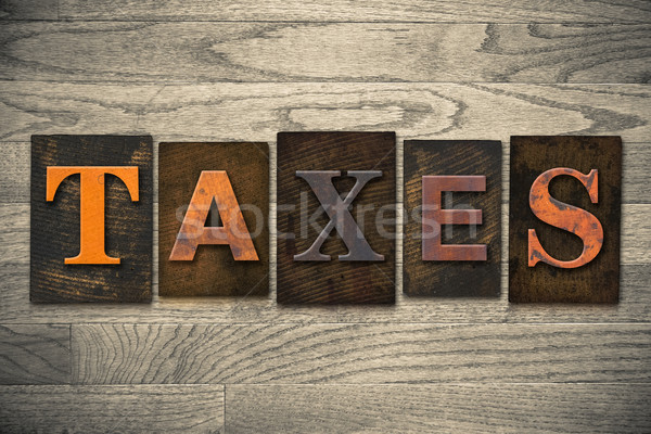 Taxes Concept Wooden Letterpress Type Stock photo © enterlinedesign