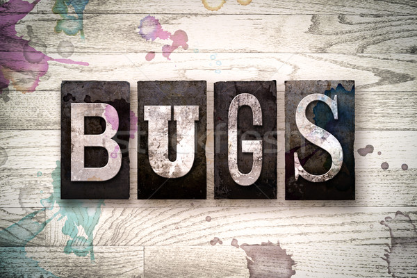 Bug metaal type woord geschreven Stockfoto © enterlinedesign