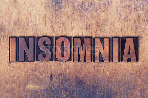 Insomnia Theme Letterpress Word on Wood Background Stock photo © enterlinedesign