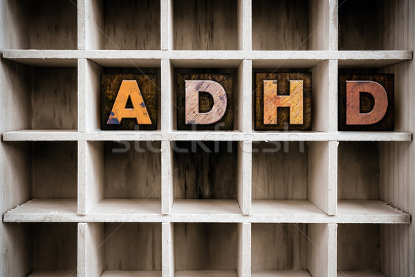 ADHD Concept Wooden Letterpress Type in Draw Stock photo © enterlinedesign