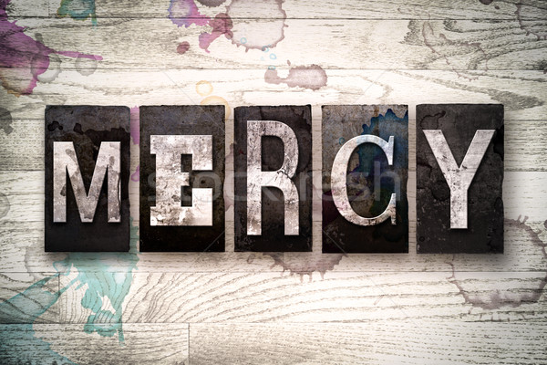 Mercy Concept Metal Letterpress Type Stock photo © enterlinedesign