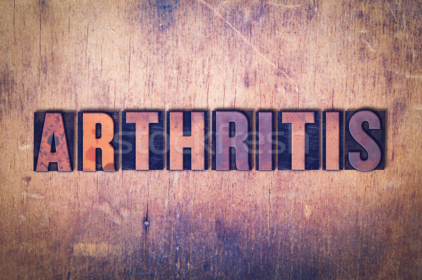 Arthritis Theme Letterpress Word on Wood Background Stock photo © enterlinedesign