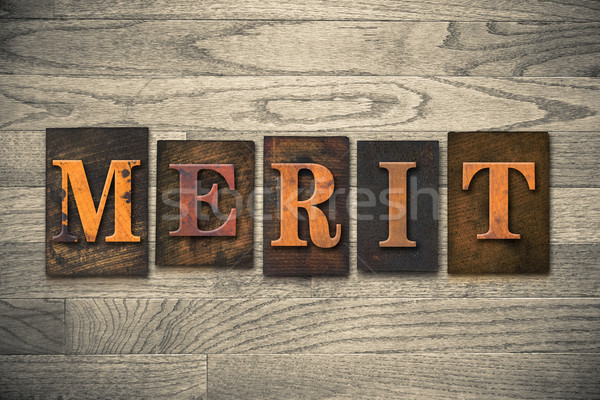Meritare legno parola scritto vintage Foto d'archivio © enterlinedesign