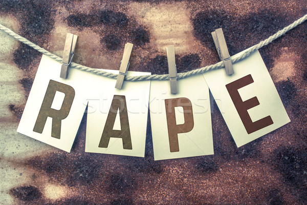 Stock photo: Rape Concept Pinned Stamped Cards on Twine Theme