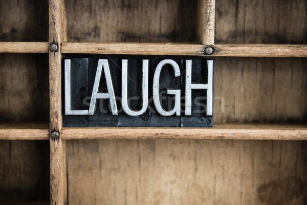 Laugh Concept Metal Letterpress Word in Drawer Stock photo © enterlinedesign