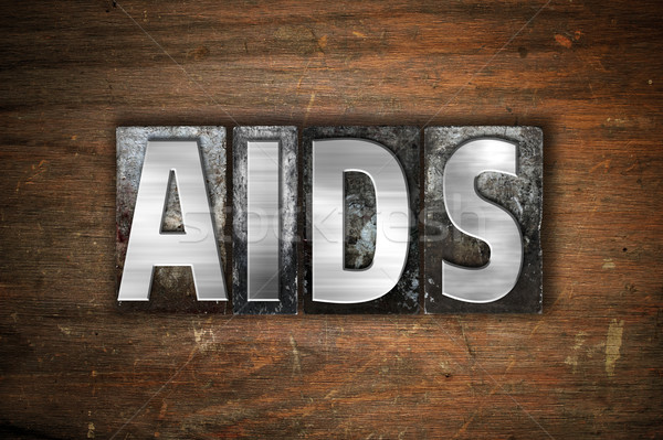 AIDS Concept Metal Letterpress Type Stock photo © enterlinedesign