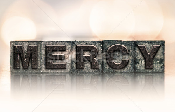 Mercy Concept Vintage Letterpress Type Stock photo © enterlinedesign