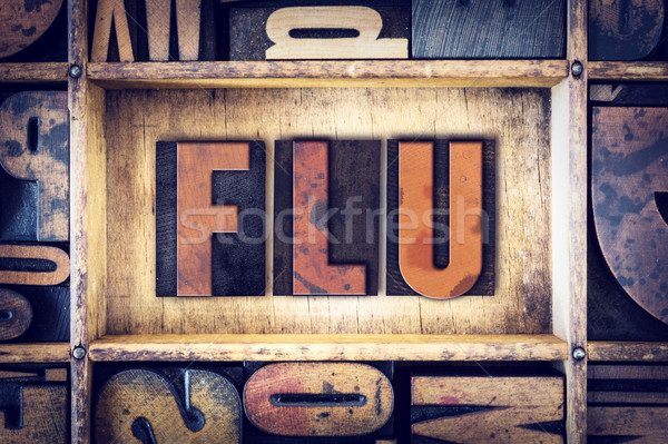 Grippe Buchdruck Typ Wort geschrieben Jahrgang Stock foto © enterlinedesign