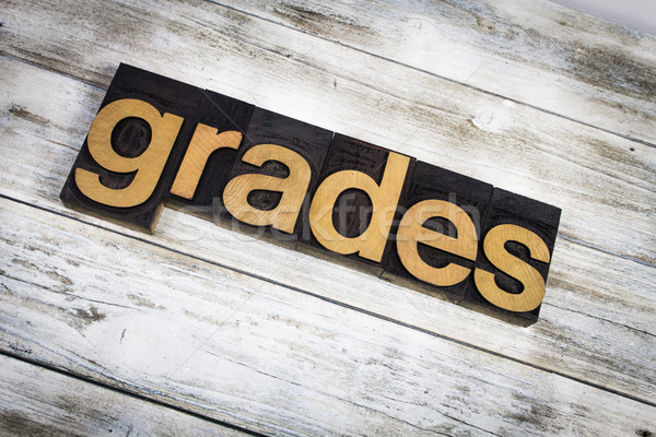 Grades Letterpress Word on Wooden Background Stock photo © enterlinedesign