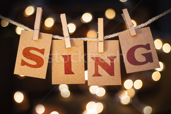 şarkı söylemek kartları ışıklar kelime basılı clothespin Stok fotoğraf © enterlinedesign