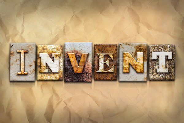 Invent Concept Rusted Metal Type Stock photo © enterlinedesign