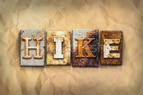 Hike Concept Rusted Metal Type Stock photo © enterlinedesign