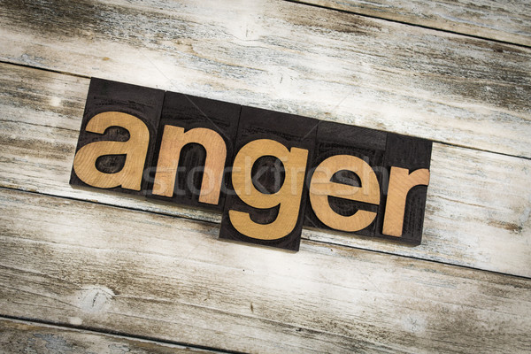 Anger Letterpress Word on Wooden Background Stock photo © enterlinedesign