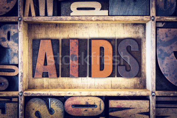 AIDS Concept Letterpress Type Stock photo © enterlinedesign