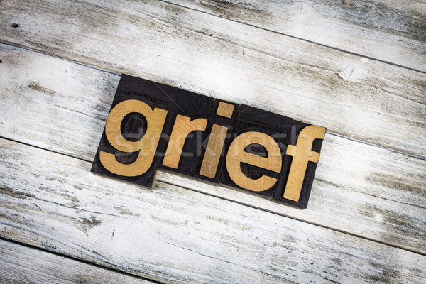 Grief Letterpress Word on Wooden Background Stock photo © enterlinedesign