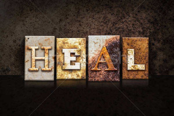 Heal Letterpress Concept on Dark Background Stock photo © enterlinedesign