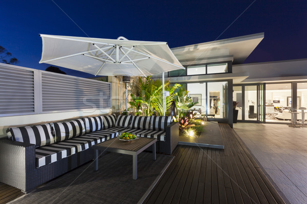 Modern erkély naplemente luxus penthouse ház Stock fotó © epstock