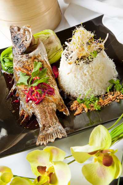 Australian Barramundi, served with fragrant Jasmine rice and wil Stock photo © epstock