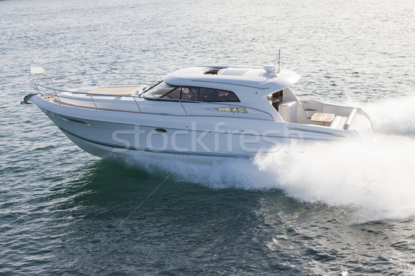 Elegant motor boat sailing at high speed Stock photo © epstock