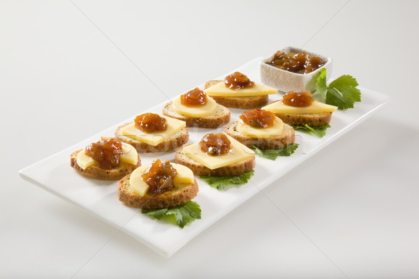 Bagel crisps with chutney and cheese Stock photo © epstock