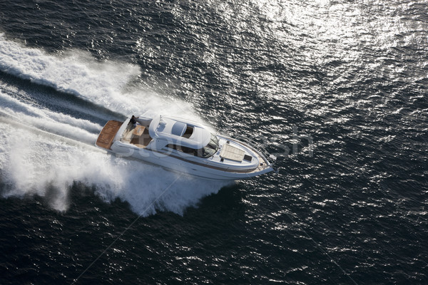 White yacht dashing through the ocean Stock photo © epstock