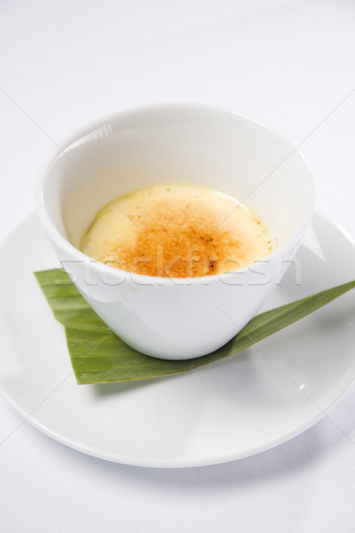 Creme Brulee served in white bowl Stock photo © epstock
