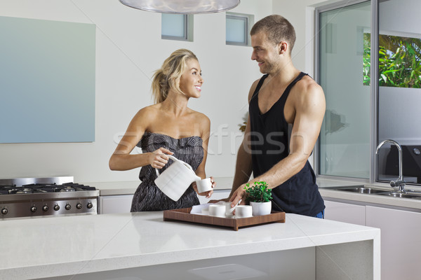 Fiatal pér modern konyha fiatal vonzó pár Stock fotó © epstock