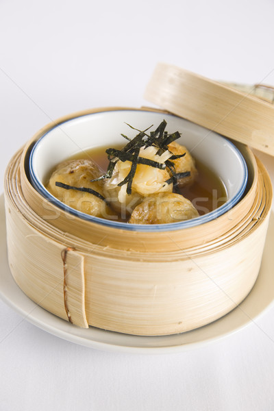 dumplings in bamboo steamer Stock photo © epstock