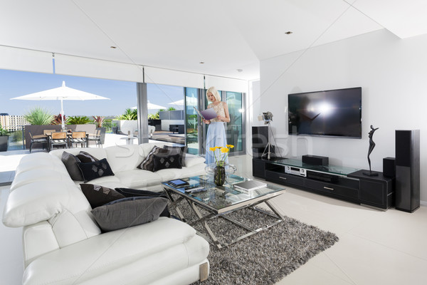 Girl in living room Stock photo © epstock