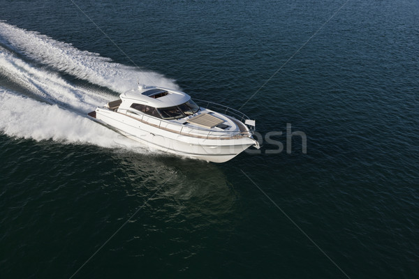 Elegant yacht sailing through the sea Stock photo © epstock